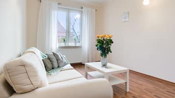 Appartement | Woonkamer | Flatscreentelevisie