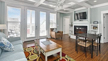 Luxury Condo, 1 Bedroom | Living area | Flat-screen TV, fireplace, DVD player, toys