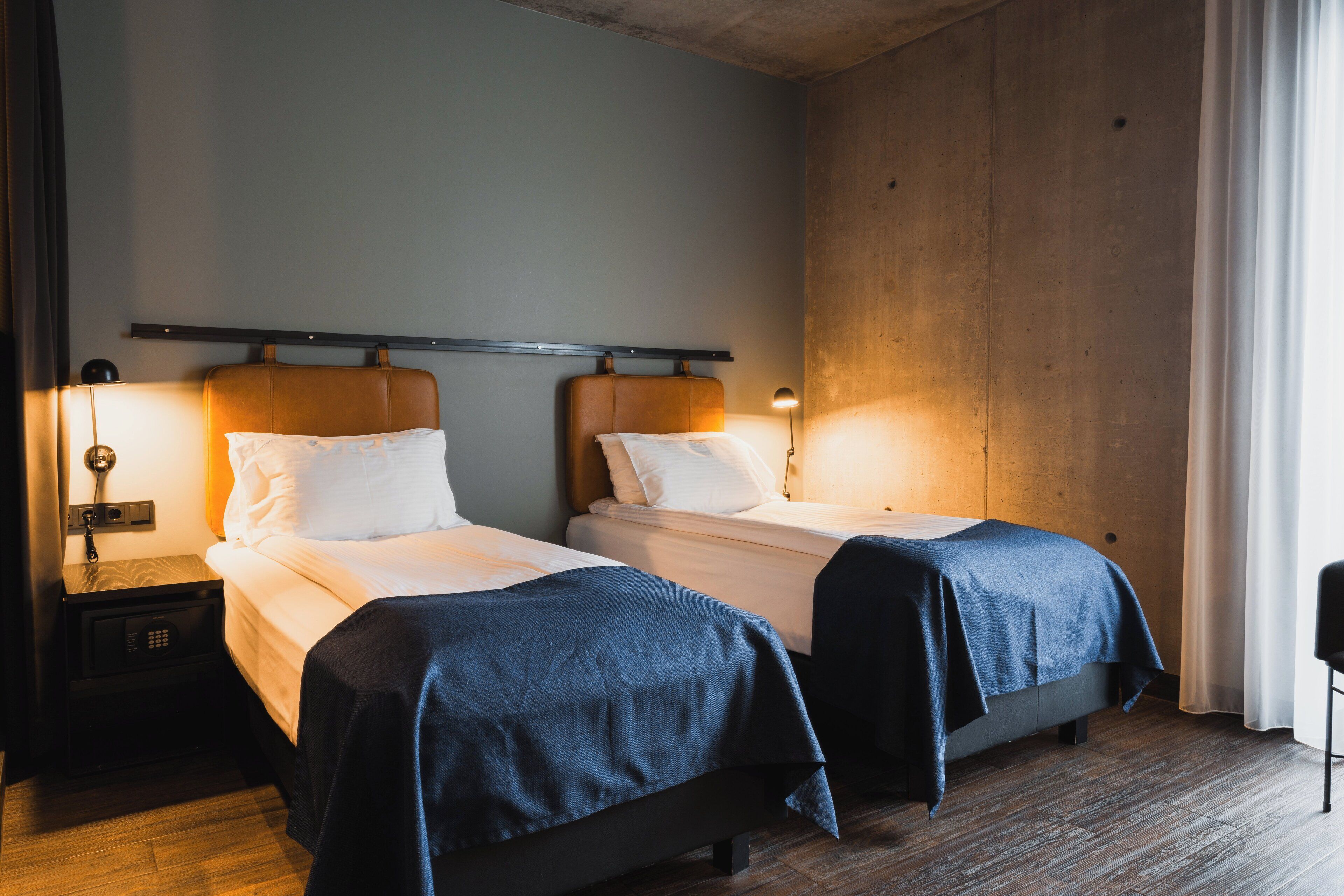 Hypo-allergenic bedding, in-room safe, blackout curtains