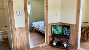 Standard Cabin, 1 Bedroom | Living area | Flat-screen TV
