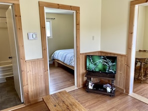 Standard Cabin, 1 Bedroom | Living area | Flat-screen TV