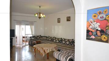 Apartment, City View | Living area | 42-inch LCD TV with satellite channels, TV