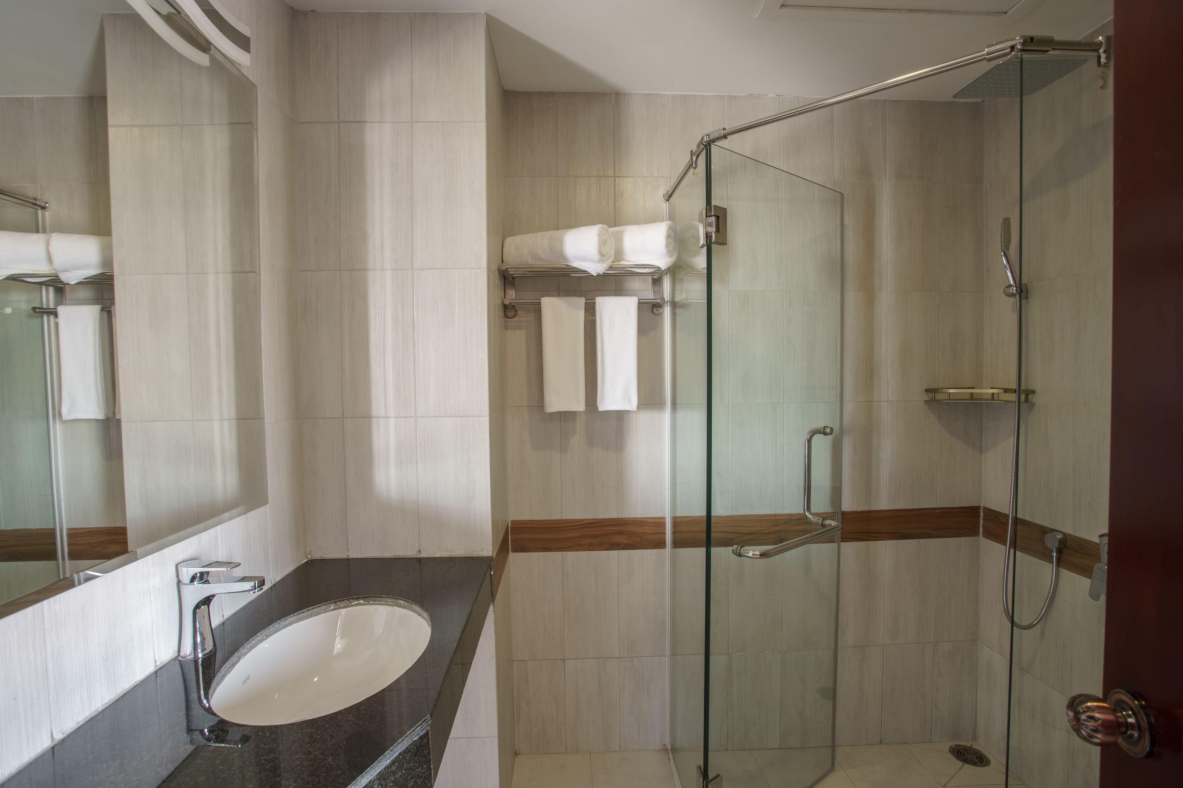 deluxe double room | bathroom | free toiletries, dressing gowns, slippers, towels