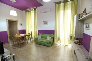 Apartment, 2 Bedrooms | Living area | Flat-screen TV