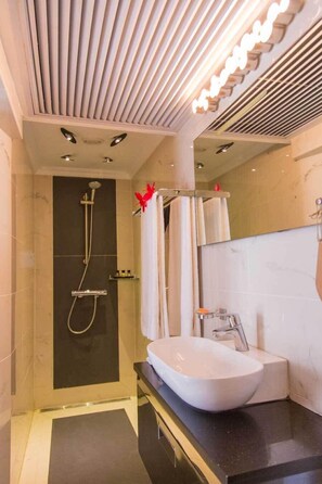 Shower, free toiletries, towels, soap