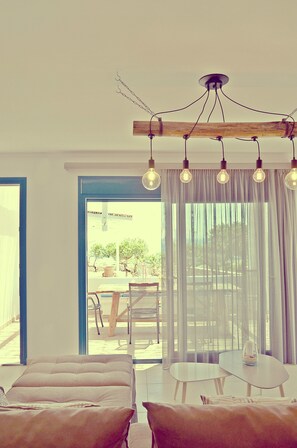 Luxury Villa, 1 Bedroom, Partial Ocean View | Living area | Flat-screen TV, DVD player - Mastiha Villas (Chios)