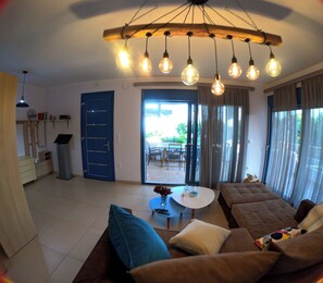 Luxury Villa, 2 Bedrooms, Partial Ocean View | Living area | Flat-screen TV, DVD player - Mastiha Villas (Chios)