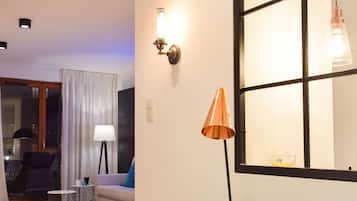 Deluxe Apartment, 1 Bedroom, Garden View | Living area | Flat-screen TV