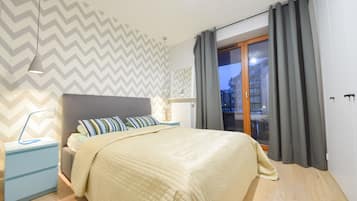 Deluxe Apartment, 1 Bedroom, Garden View | 1 bedroom, desk, iron/ironing board, cots/infant beds