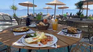 Breakfast, lunch, dinner served; Greek cuisine, beach views  - Avra Boutique (Corfu)