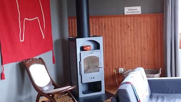 Family Chalet, 4 Bedrooms, Sauna, Lakeside | Living area | Flat-screen TV, fireplace