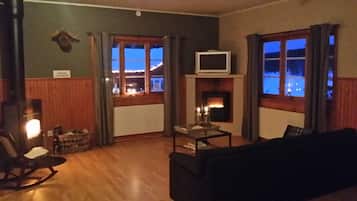 Family Chalet, 4 Bedrooms, Sauna, Lakeside | Living area | Flat-screen TV, fireplace