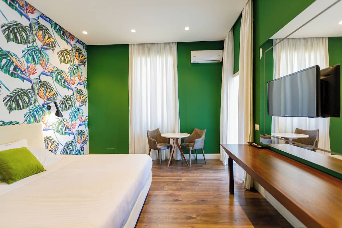 Deluxe Double Room, Sea View | Premium bedding, minibar, in-room safe, desk