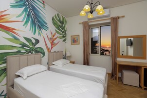 Standard Quadruple Room, Sea Facing | Premium bedding, minibar, in-room safe, desk