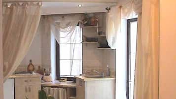 Apartment (Duplex) | Private kitchenette | Fridge, microwave, stovetop, coffee/tea maker