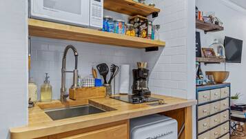 Fridge, microwave, stovetop, coffee/tea maker