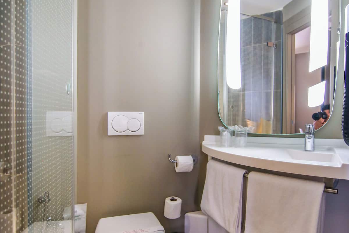 shower, eco-friendly toiletries, hair dryer, towels