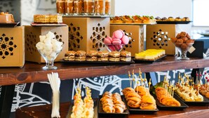 A buffet with various desserts and snacks. - ibis Sfax (Sfax Ouest)