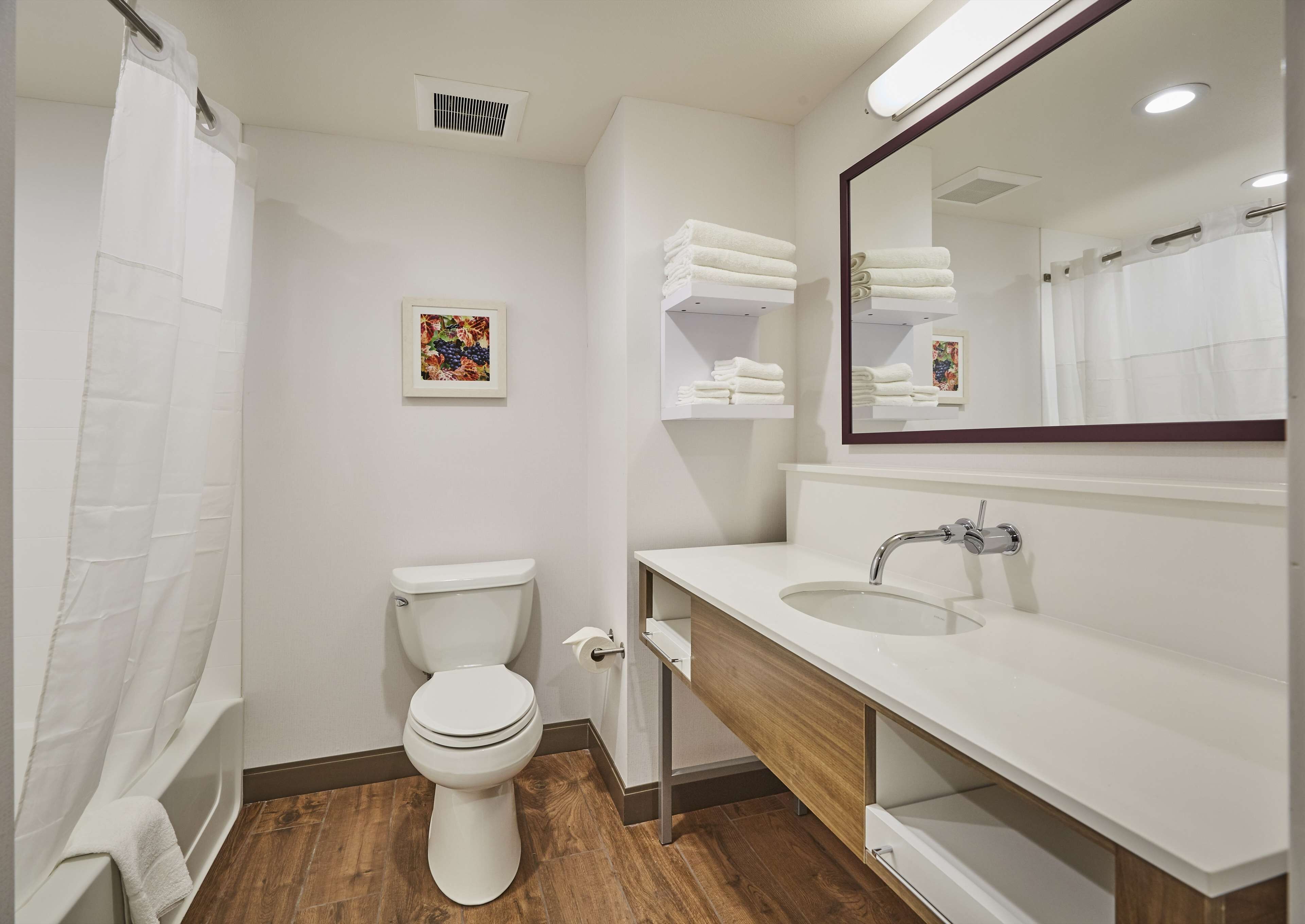 combined shower/bathtub, free toiletries, hair dryer, bathrobes