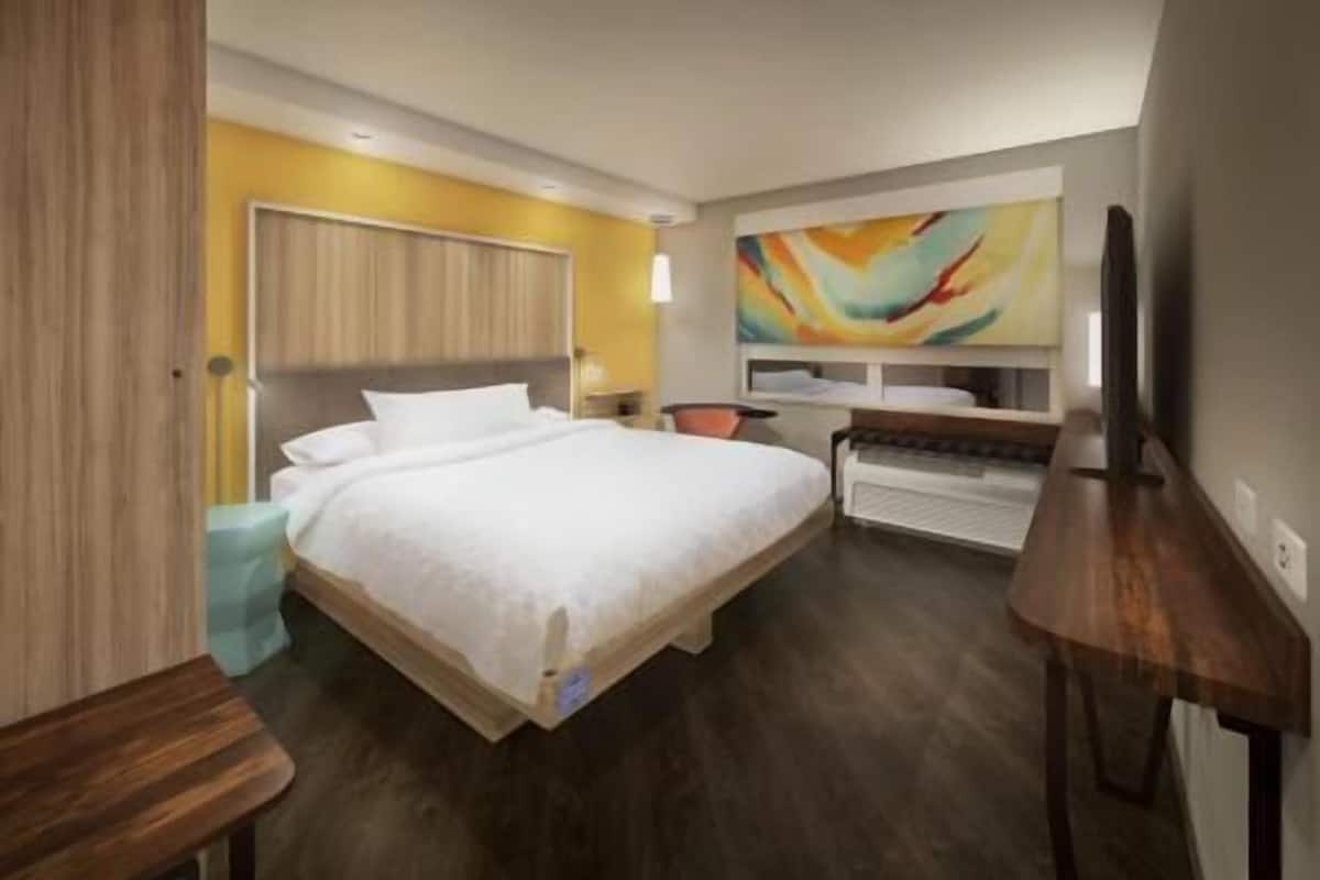 Premium bedding, down comforters, pillowtop beds, in-room safe