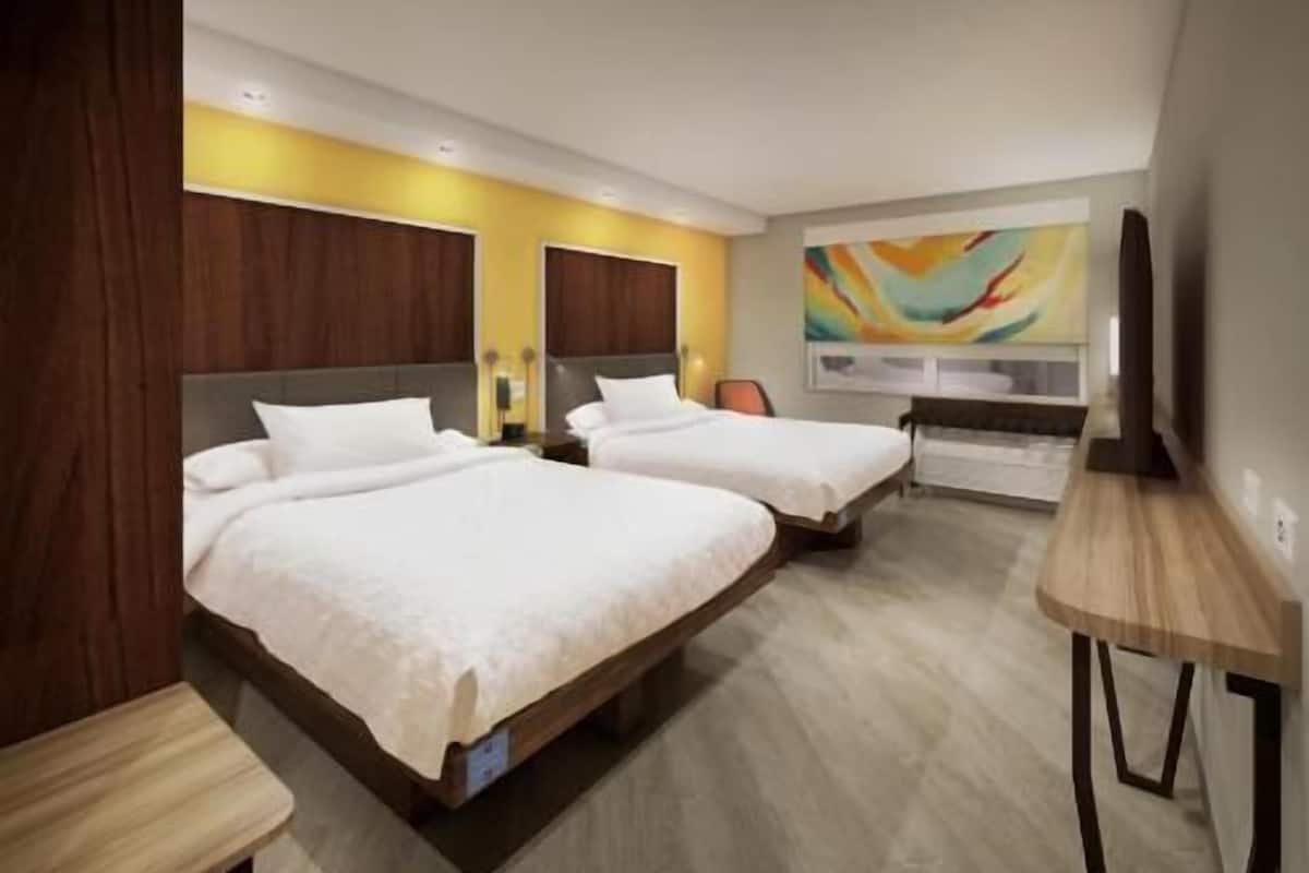 Premium bedding, down comforters, pillowtop beds, in-room safe