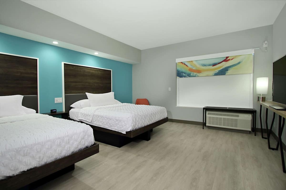 Premium bedding, down comforters, pillowtop beds, in-room safe