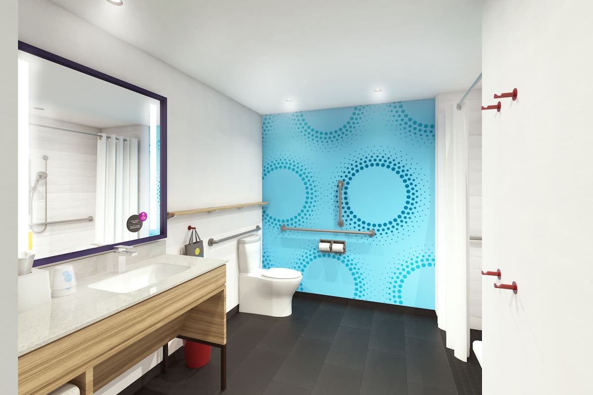 hydromassage showerhead, hair dryer, towels, soap