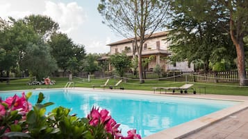 Seasonal outdoor pool, open 8:00 AM to 8:00 PM, sun loungers