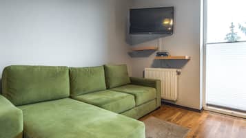 Deluxe Studio Suite ( Kozietulskiego 4) | Living area | Flat-screen TV