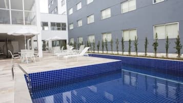 Outdoor pool, pool umbrellas, pool loungers
