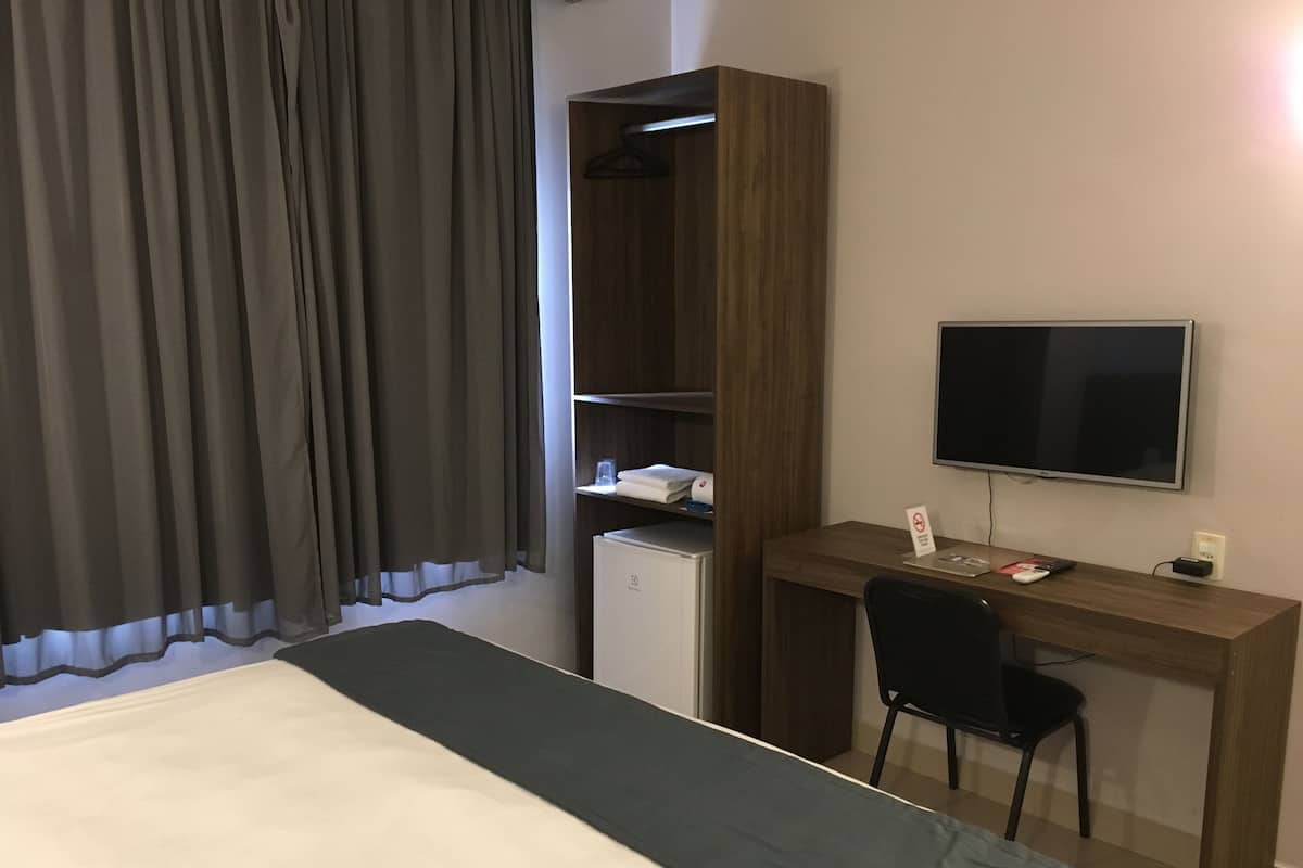 Deluxe Single Room | Minibar, desk, iron/ironing board, free WiFi