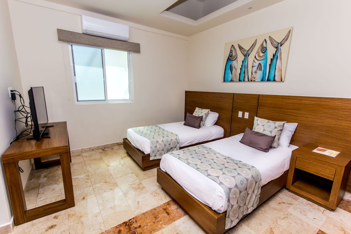 Premium bedding, iron/ironing board, free WiFi, bed sheets