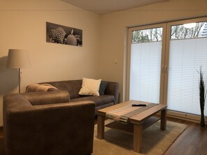 Luxury Condo, 2 Bedrooms, Non Smoking, Kitchen | Living room | 55-inch flat-screen TV with satellite channels, TV - Ferienpark Thüle (Friesoythe)