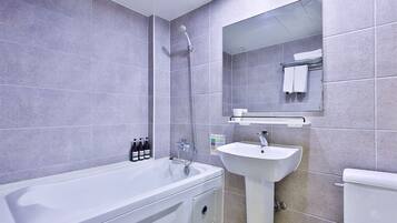 Business Double Room | Bathroom | Free toiletries, hair dryer, bathrobes, slippers