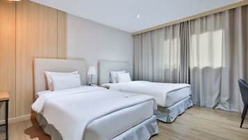 Chambre Deluxe avec lits jumeaux | Bureau, chambres insonorisées, Wi-Fi gratuit, draps fournis