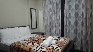 Family Suite with Balcony | 2 bedrooms, desk, WiFi (free), bed sheets