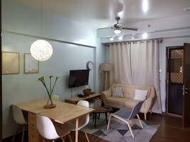 Condo, 2 Bedrooms | Living area | 32-inch flat-screen TV with satellite channels, TV