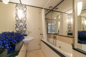 Shower, jetted tub, hair dryer, bidet