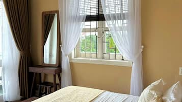 Deluxe Double Room, Balcony, City View | Minibar, individually furnished, desk, laptop workspace