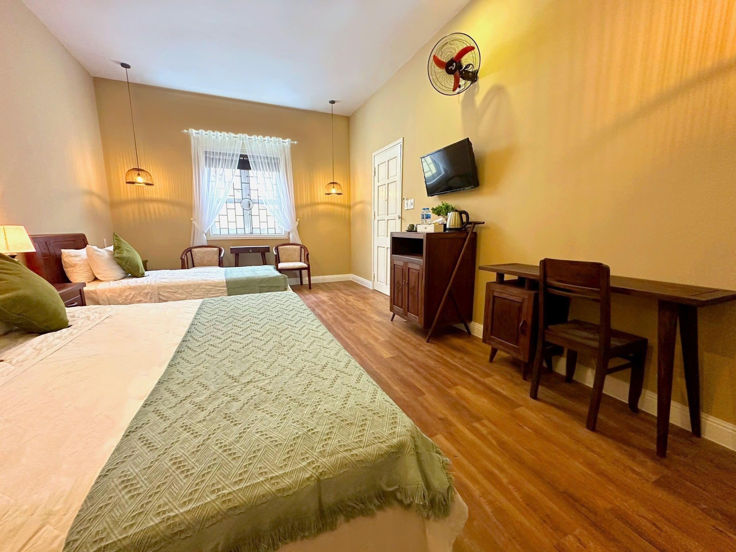 family triple room | minibar, individually furnished, desk, laptop workspace