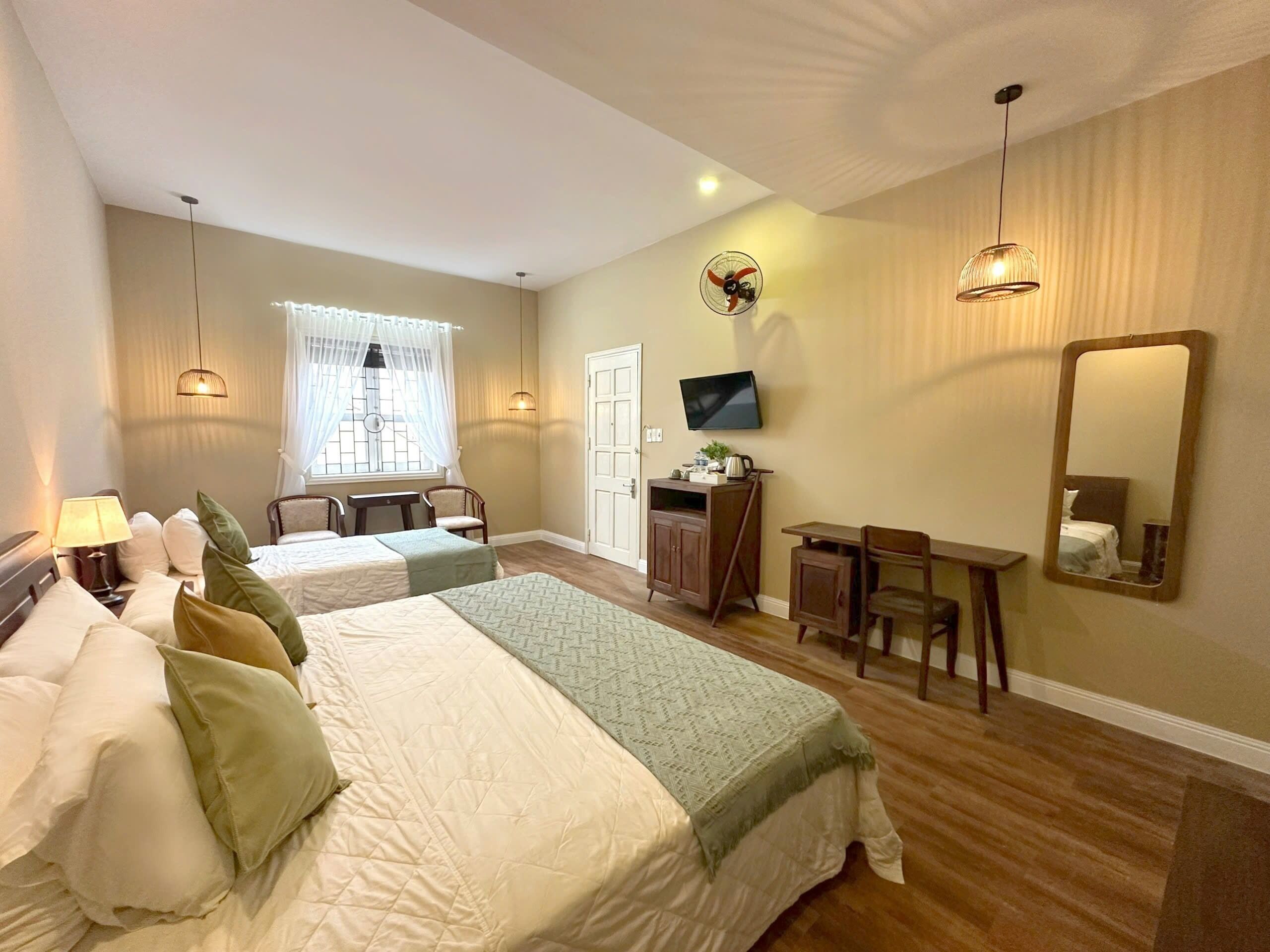 family triple room | minibar, individually furnished, desk, laptop workspace