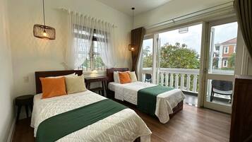 Deluxe Twin Room, Balcony, City View | Living area | Flat-screen TV
