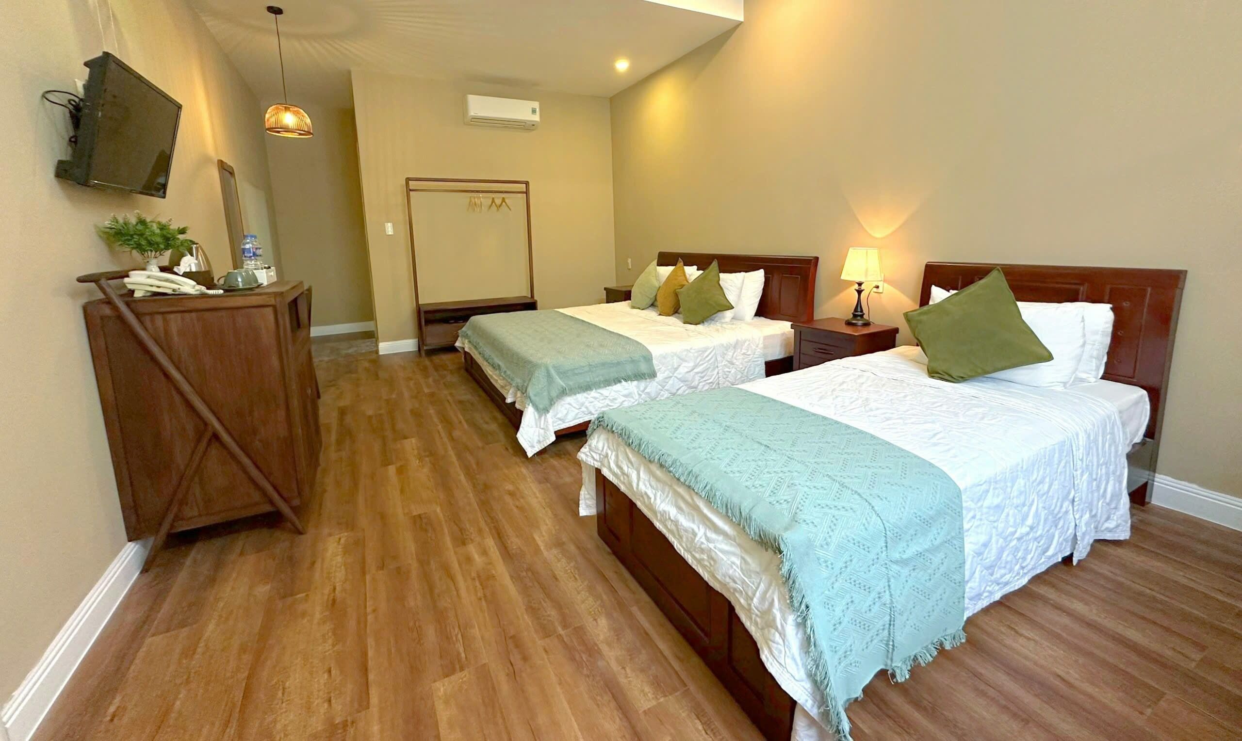 family triple room | minibar, individually furnished, desk, laptop workspace