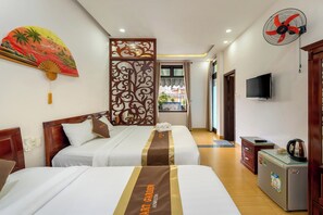 Family Triple Room, Terrace | Minibar, desk, blackout drapes, soundproofing - Smart Garden Homestay (Da Nang)