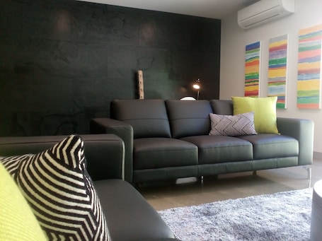 Luxury Apartment, 2 Bedrooms | Living room | LED TV, fireplace, DVD player