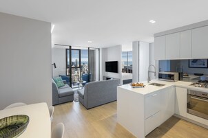 Three Bedroom Sky Apartment | Living area | 55-inch Smart TV with digital channels