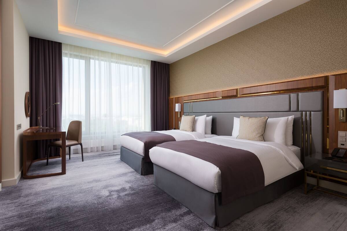 Superior Twin kamer | Luxe beddengoed, een minibar, een kluis op de kamer, een bureau