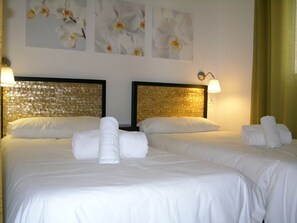 2 dormitoris, planxa i posts de planxar, wifi gratuïta i roba de llit