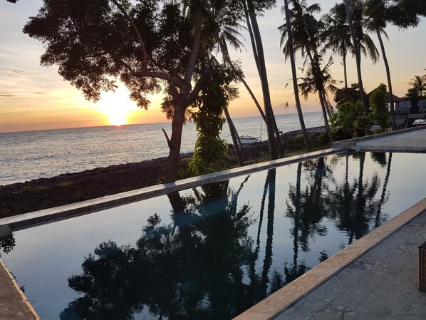 Shared Dormitory | Outdoor pool | 3 outdoor pools, a lap pool, pool umbrellas, sun loungers - Bali Apnea Club - Hostel (Kubu)