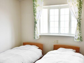 Chambre avec lits jumeaux